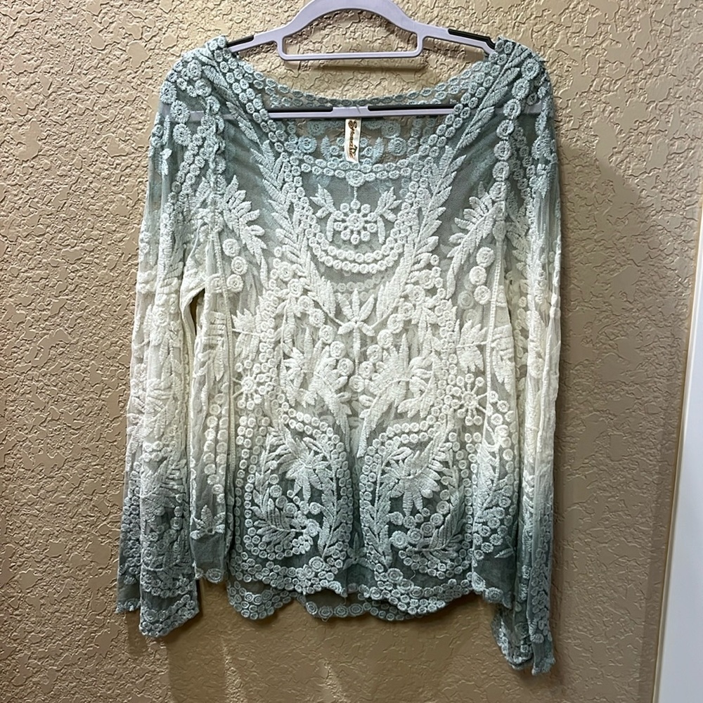 Beautiful shoreline lace sheer top